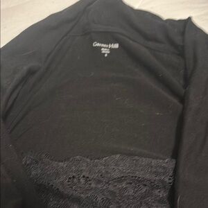 garnet black stylish top. Size small - runs a little big.